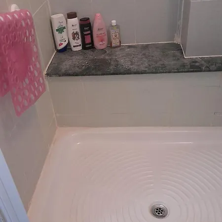 Whole In Surrounded By Apartment *